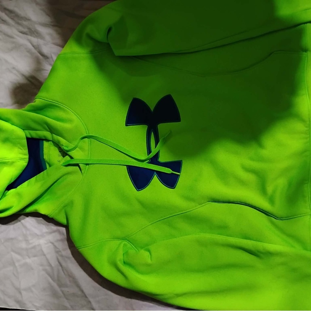 Under Armour Neon Green Hoodie with blue symbol on front in size youth large